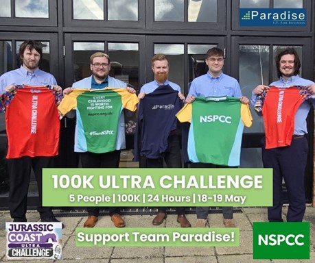 Team Paradise group photo. Ash, Gareth, Alex, Rob, Rachmann hold NSPCC t-shirts.